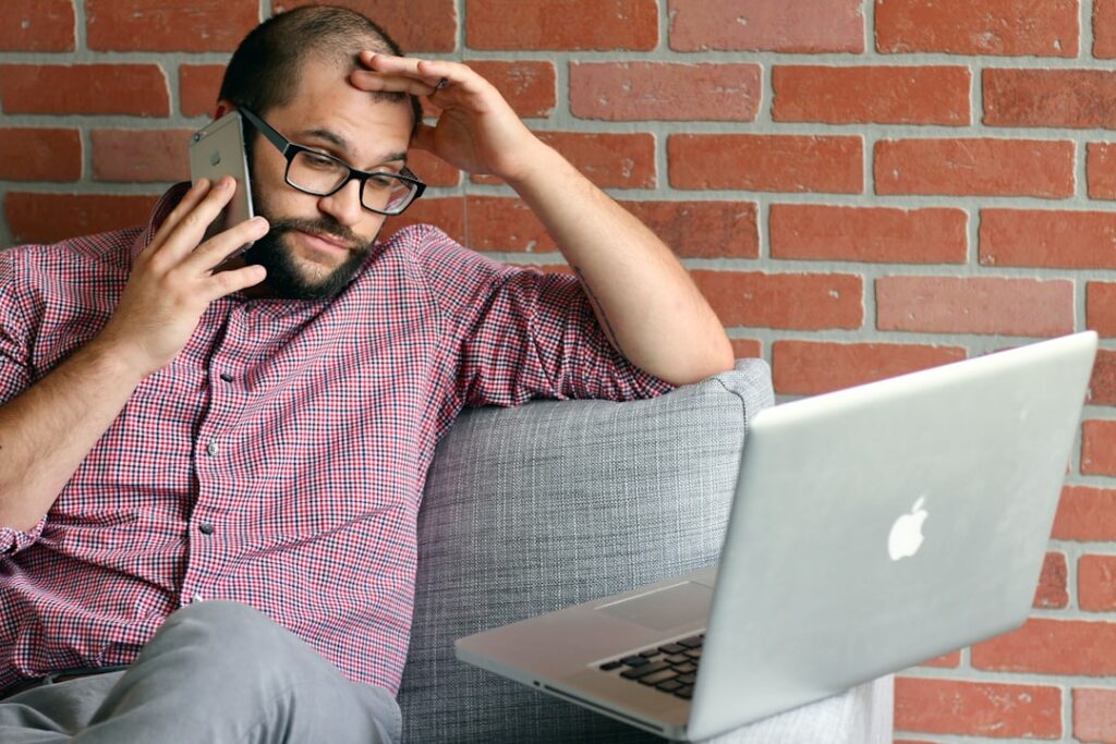 Business owner checking a missed call notification on their phone