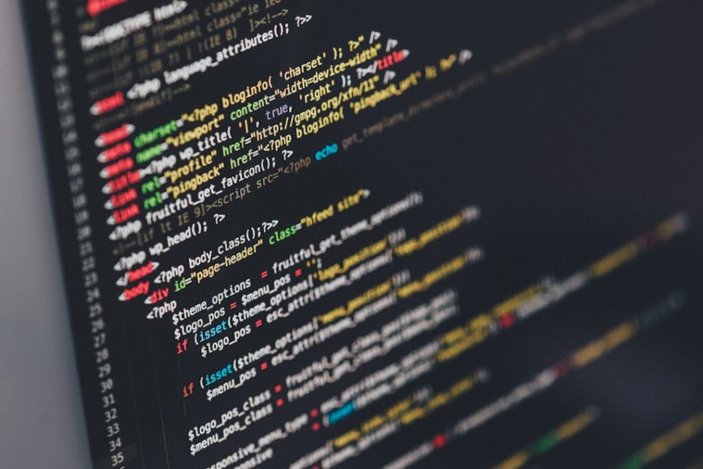 Close-up of website code being debugged on a monitor